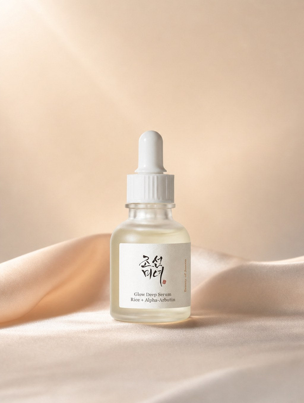 Beauty of Joseon Glow Deep Serum on champagne satin